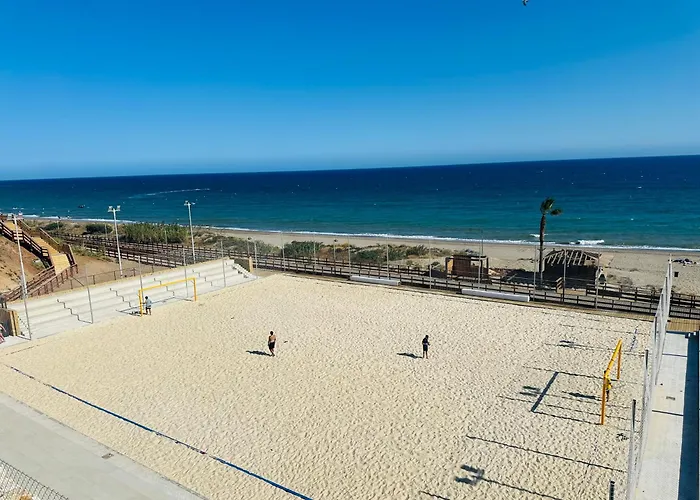 Frente A La Playa Boutique En *